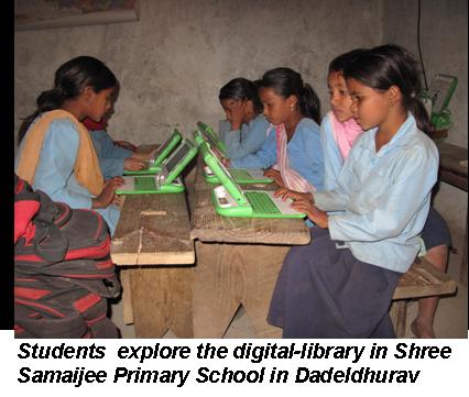 Children using a cheap high accessibility laptop.