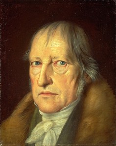 A portrait of Hegel, staring at the reader. He has intense blue eyes and wispy grey hair.